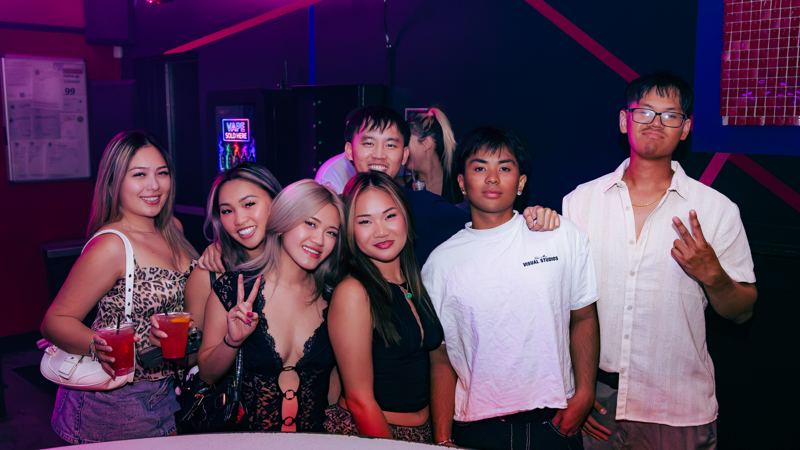 A group of friends posing together at Tokyo Joe's
